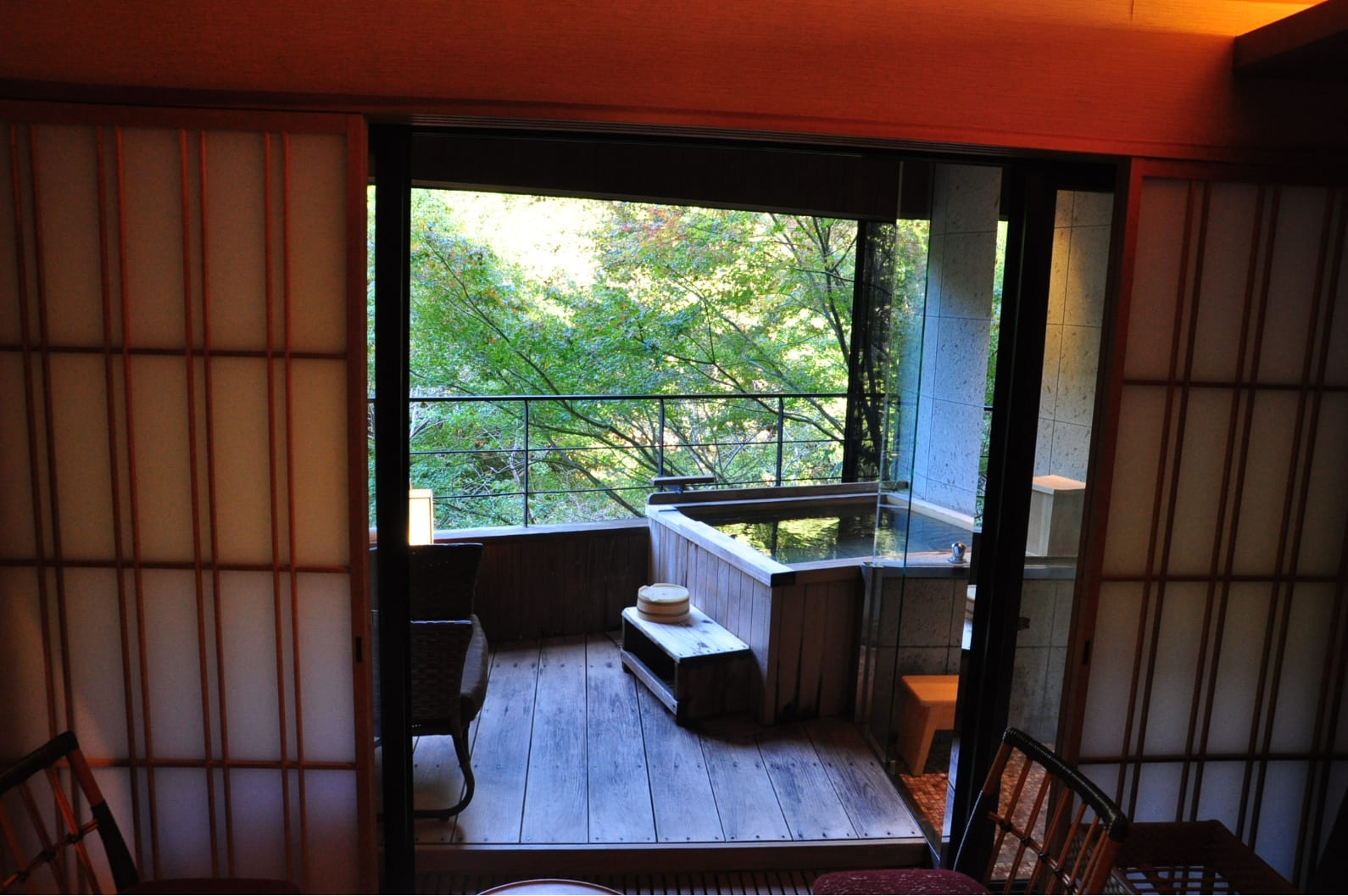 with tubs constructed out of elegant wood and stone